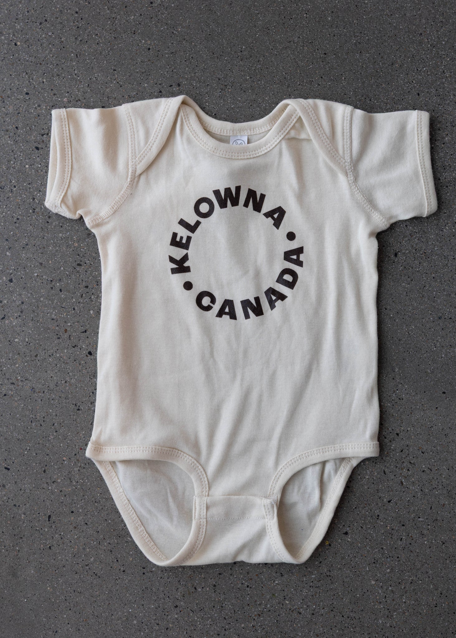 Natural/Smudge 'Kelowna • Canada' Baby Onesie